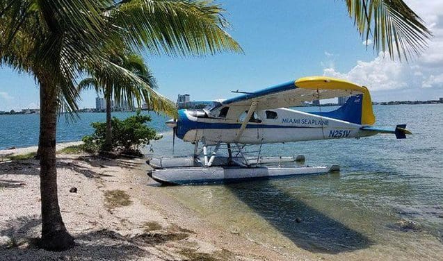 A small plane sitting on top of the water.