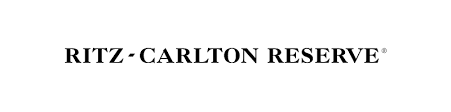 A black and white image of the logo for carlton realty.