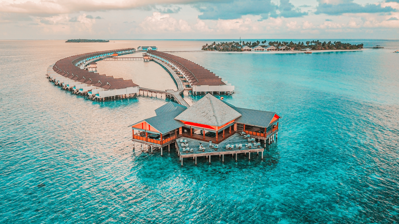 A large wooden structure in the middle of an ocean.