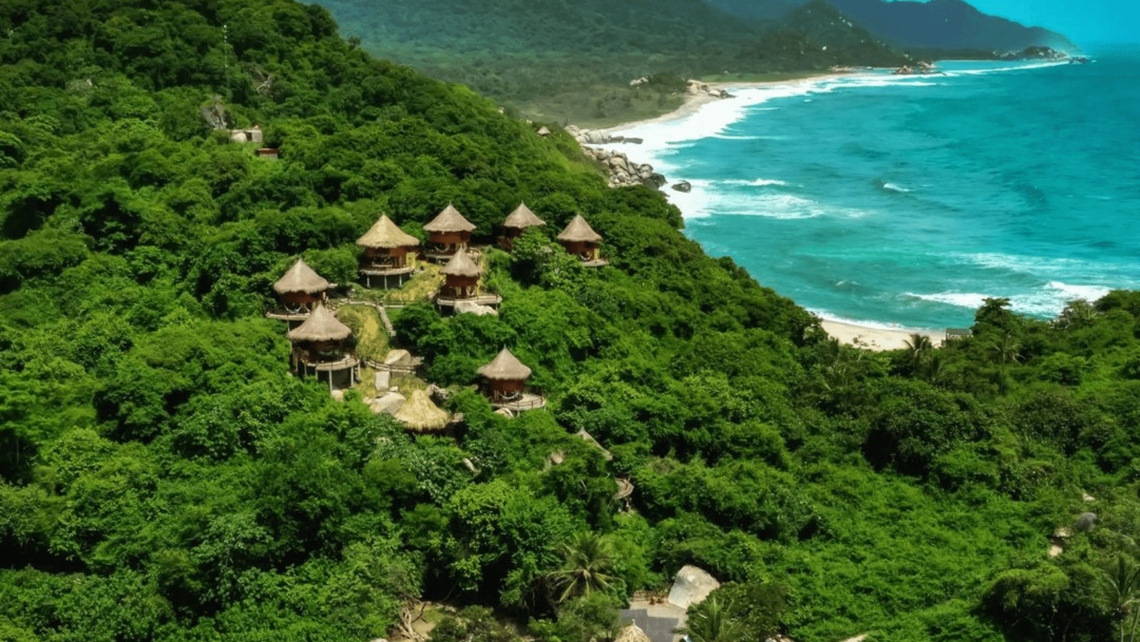 A view of some houses on the side of a hill.