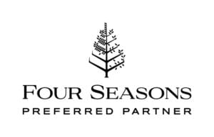 A black and white logo of four seasons