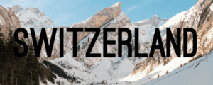 A mountain with snow on it and the word " tzerl ".